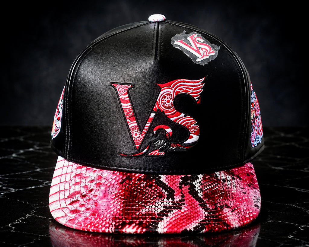 V-SQRD Detroit Heritage Premium Leather Snapback – Red Snakeskin Edition Only a limited number were produced. Once sold out, this design will not be restocked. Built for individuals who move with Vision, Strength, Quality, Respect, and Discipline.