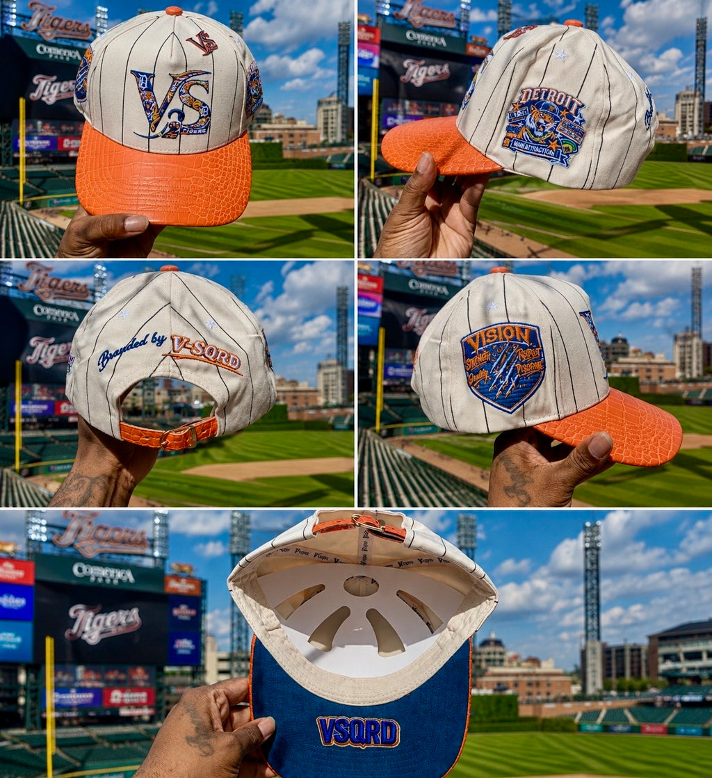 V-SQRD Detroit Diamond Premium Pinstripe Snapback – Orange Croc Edition The cream pinstripe body delivers a timeless classic look while the orange croc-textured brim creates a luxury finish that immediately grabs attention.

Combined with custom Detroit-i
